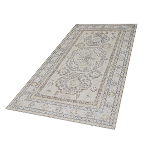 This one-of-a-kind Ariana rug is a stunning revival of the celebrated Agra 505 design, known for the large-scale palmettes...