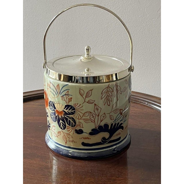 Imari Pattern Biscuit Barrel. 22 cms to top of open handle. 14 cms diameter.