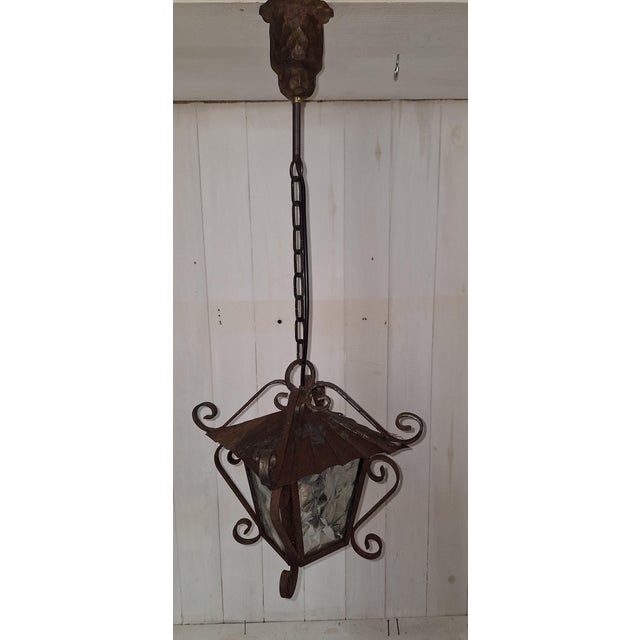 Vintage Rustic German Hanging Lamp in Lantern Shape with Iron, 1980s, in Good conditions. Designed 1980 to 1989 Up to 250V...
