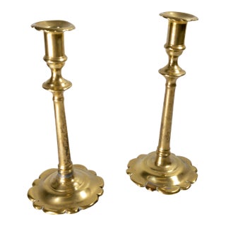 18th Century Pair of English Brass Queen Anne Candlesticks With Petal Base For Sale