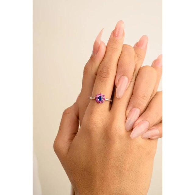 Tiny Everyday Sapphire Ruby Halo Flower Ring in 14K Gold featuring natural blue sapphire and ruby of 0.74. The gorgeous...