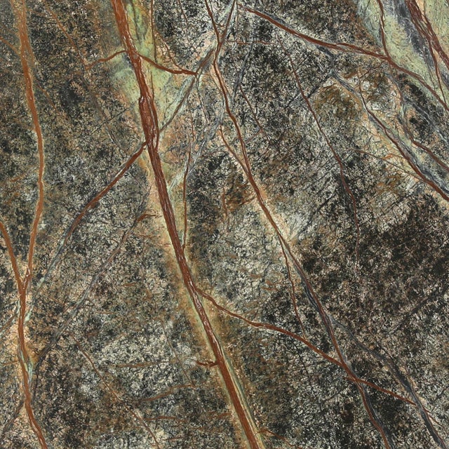 Round green marble side table with pedestal base. Greens, browns, and creams create a beautiful mixture of tones. Each...