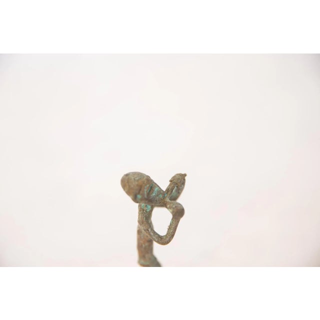 Vintage African Oxidized Copper Man Eating For Sale - Image 4 of 6