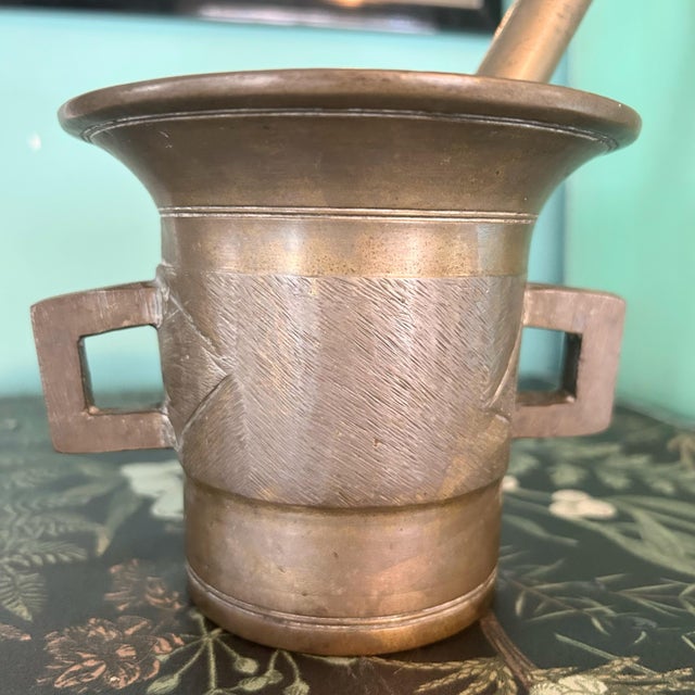 Vintage 19th Century Pharmacy Apothecary Brass Mortar and Pestle Set. Beautiful set. Measures 4.85” H x 5” diameter at...
