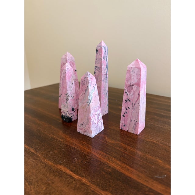 A stunning set of five neoclassical Grand Tour style solid marble pink & cream obelisks. A favorite of designers, obelisks...
