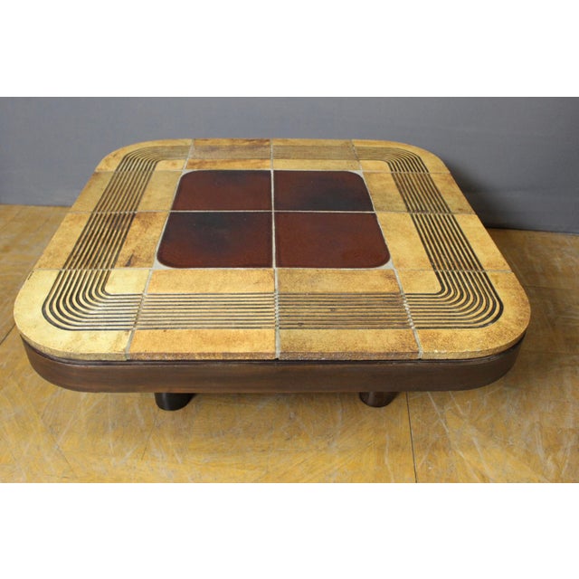 Coffee table by Roger Capron (1922/2006), Model TN12 known as Mambo, created in 1974, glazed ceramic top and wooden base,...
