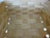Vintage light brown picnic basket with 2 handles of carrying. The top is secured by 2 metal backets allowing the lid to...