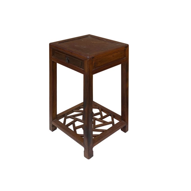Introducing a captivating Vintage Chinese Worn Out Patina Light Brown Square Pedestal Plant Stand, a unique piece that...