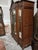 Impressive late 19th–early 20th century French Louis XV Revival triple-door armoire, crafted in solid walnut and featuring...