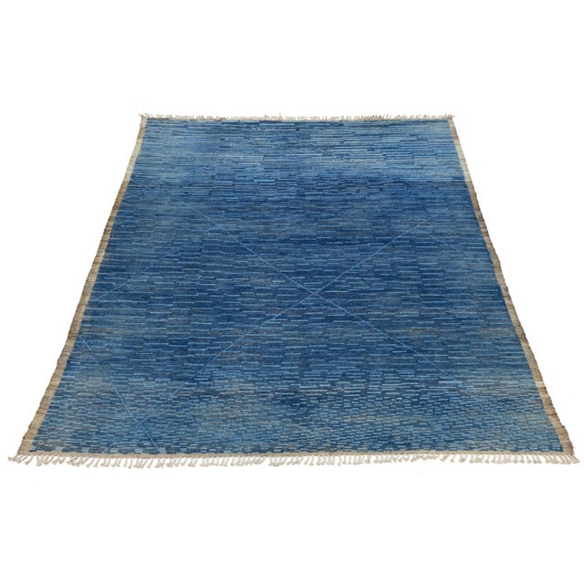 This stunning, handcrafted wool rug exemplifies contemporary Moroccan design with its eye-catching brown and beige...