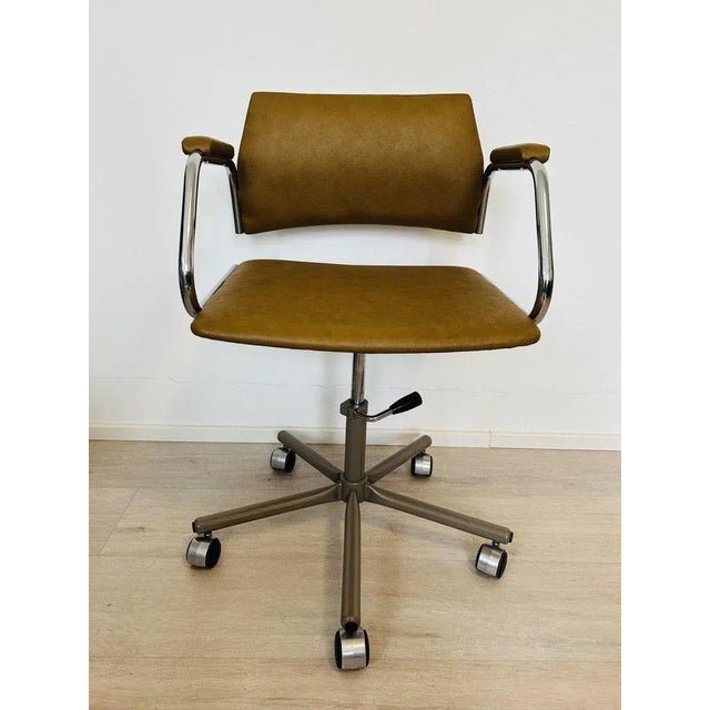 Vintage mustard office chair from kovona model k-380 the company was originally created by kovona in the czech republic,...