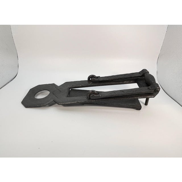 This unusual Arts and Crafts-style antique door knocker can serve two purposes: door knocker and letter box cover. If the...