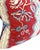 Decorative pillow in red, blue and white French style linen block print fabric front and solid blue back and welt trim.