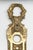 French style narrow cast brass door back plate with ribbon motif and keyhole. The original mounting screws are not...