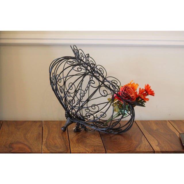 This is a gorgeous planter!! Large in size, it measures 15.5" in diameter and the basket stands 12"T from the bottom of...