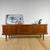 Vintage teak sideboard with rounded edges and retracting doors – mid-century scandinavian design this vintage teak...