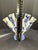Add a touch of timeless charm to your décor with this **Vintage Bella Casa by Ganz Blue & White Ceramic Floral Tulip Fan...
