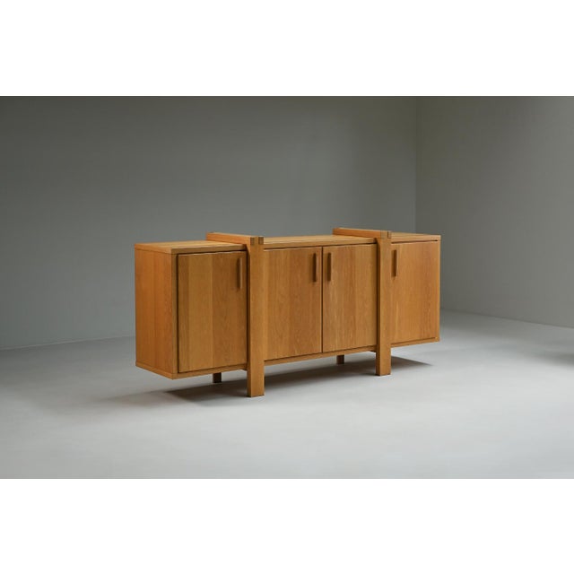 This Belgian sideboard is crafted mostly from solid oak and reflects the Brutalist style with its strong lines and...