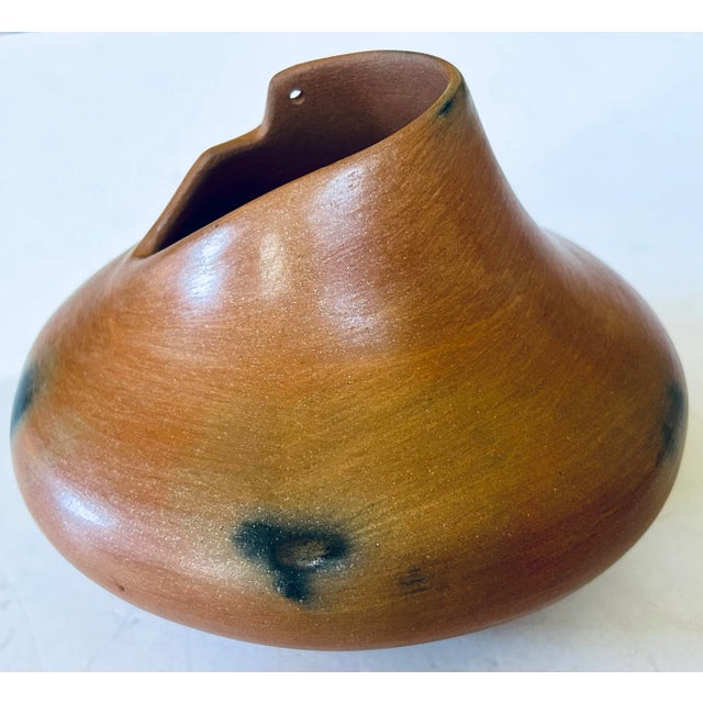This beautiful burnished pot won 2nd place in a First Nations competition. Hand formed with burnout technique for accents....