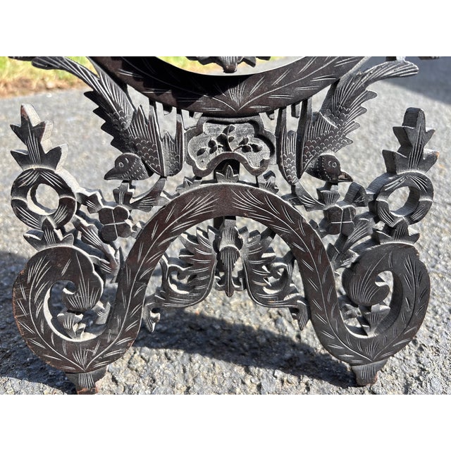 Swiss Black Forest Carved Easel Frame, ca. 1880–1900 Finely hand-carved walnut easel-back frame of tall arched form,...