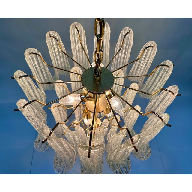This large high-quality Murano glass chandelier was handcrafted in Italy during the 1970s and is an authentic vintage...