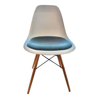 Vitra Eames Molded Dining Chairs With Pads For Sale