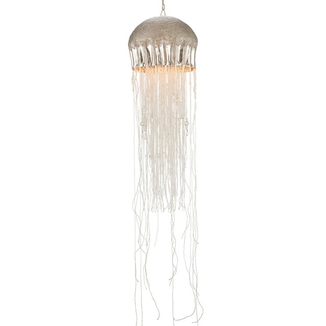 The Medusa Large Pendant effervesces with echoes of the deep sea. A nickel finish and clear beads cascading from its...