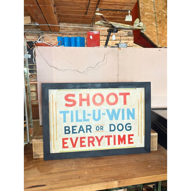 An authentic, vintage, hand-painted carnival game sign giving you a tangible look into a sign painter’s process and the...