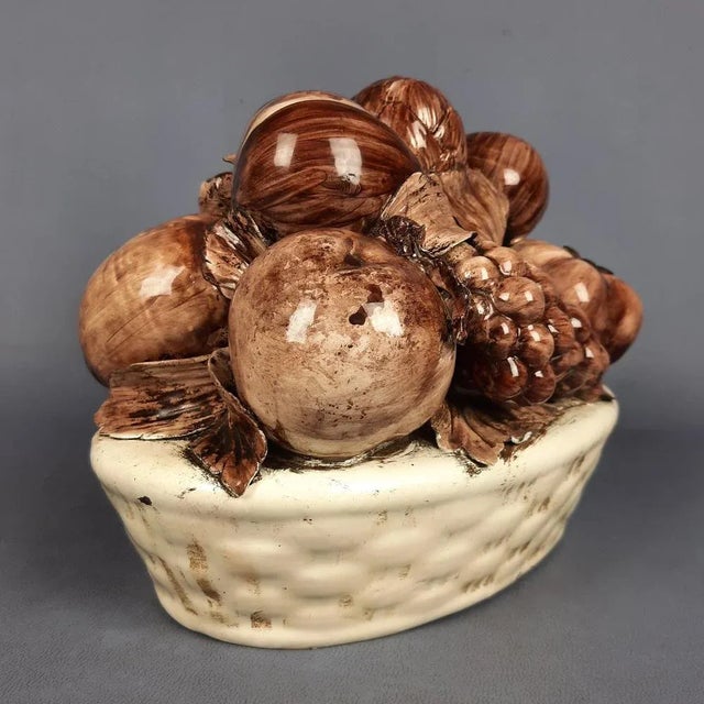 Gorgeous vintage collectible sculpture, a decorative ornament depicting a basket of fruit in white and brown majolica...
