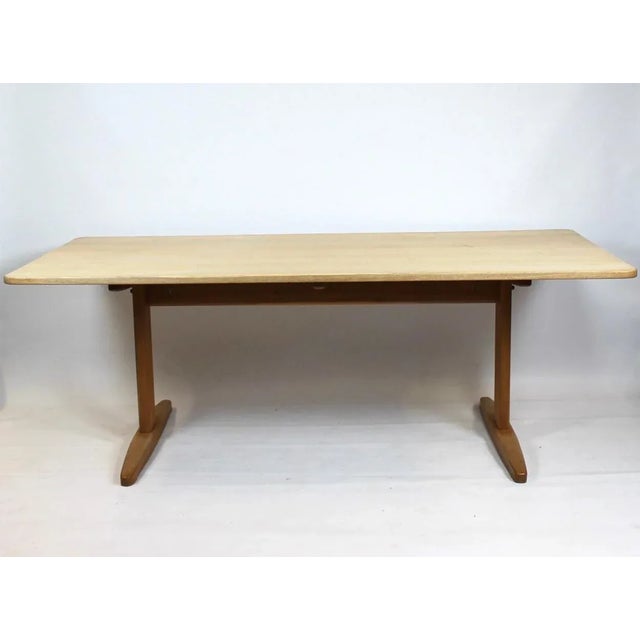 Shaker dining table, model C18, of soap treated oak designed by Børge Mogensen in 1947 and from the 1960s. The table is in...