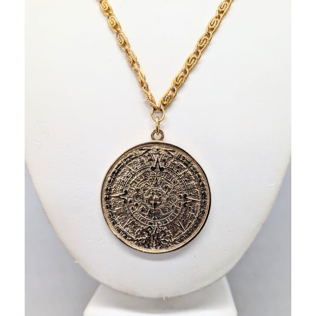 Mid-Century Modern Vintage 1970s Signed Napier Goldtone Aztec Inspired Round Pendant Necklace For Sale - Image 3 of 7