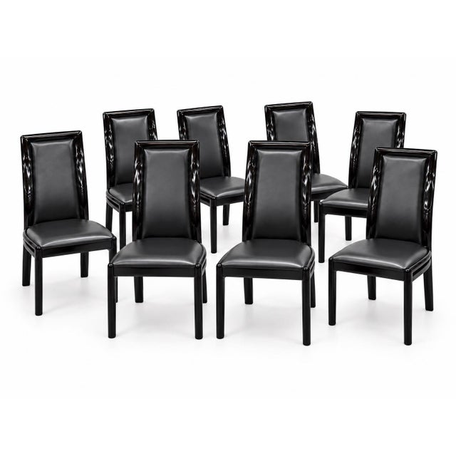 Make a bold statement with this stunning set of eight Postmodern Italian Black Lacquered Dining Chairs, circa 1990s....