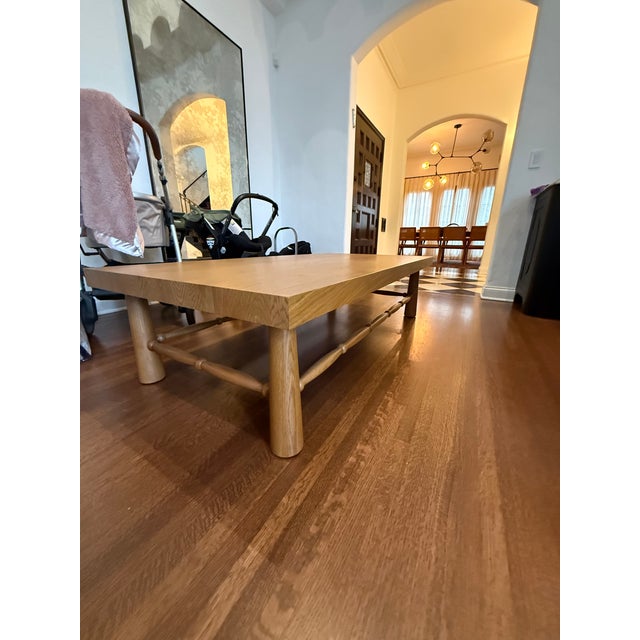 Spindle Detailed Coffee Table Dims: 63" L x 32" W x 16" H Finish: Nutmeg. We bought this custom wood coffee table and...