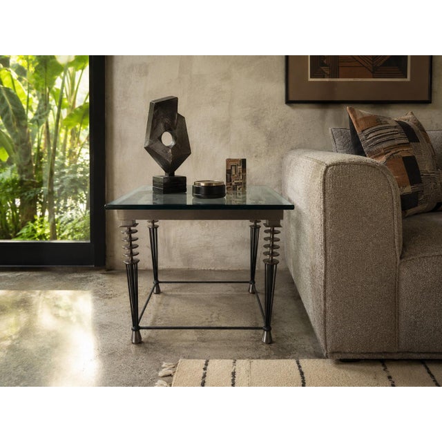 Striking 1980s side table designed by Larry Laslo for Directional, retaining its original maker’s label. This sculptural...
