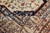 A late 19th century antique Persian Tabriz carpet, the sand field dominated by a large tree with angular flowering vines...