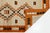 Elevate your interior with this striking hand-woven wool rug, crafted in a contemporary Southwest and Navajo-inspired...