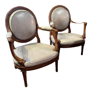 19th Century Late Pair Louis XVI Style Walnut Fauteuils