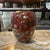 Up for consideration is a beautiful vintage Asian style red detailed ceramic vase with floral accents. This would look...