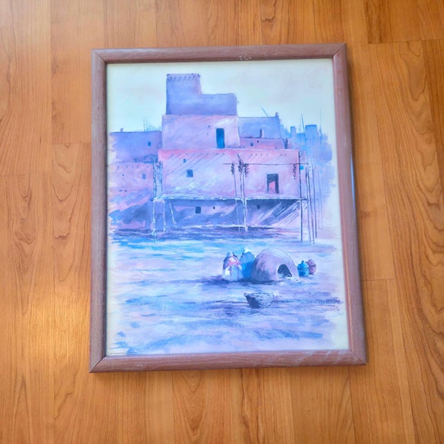 Beautiful Southwestern wall art depicting the historic Taos Pueblo in New Mexico, rendered in a soft, atmospheric palette...