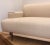 Stylish Organic Modern Oatmeal Sofa, white ash wood base, bronze finished metal legs, performance fabric, showroom floor...
