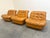 Remarks: Three mid century lounge chairs in space age style, Italy 1970s. Hard foam frames, upholstered in cognac leather....