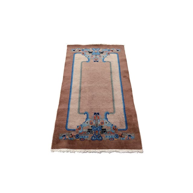 A striking example of early 20th-century craftsmanship, this vintage Chinese Art Deco rug was hand-knotted in the 1930s in...