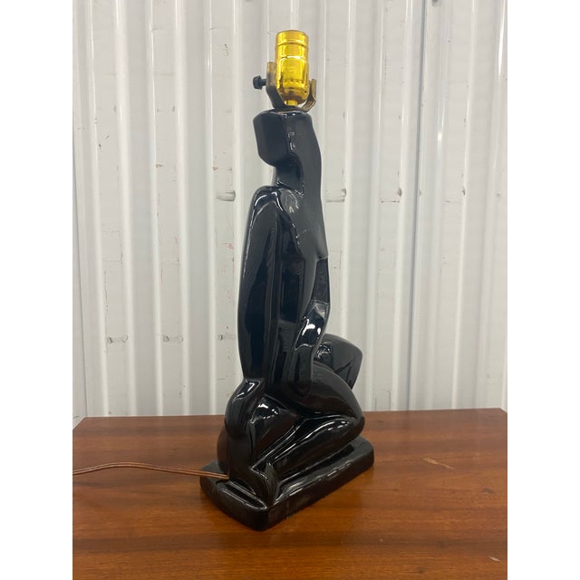 Mid-Century Modern (MCM) Abstract Cubist Nudist Woman Lamp made of glossy black ceramic.Modernist / Cubist / Art Deco. A...