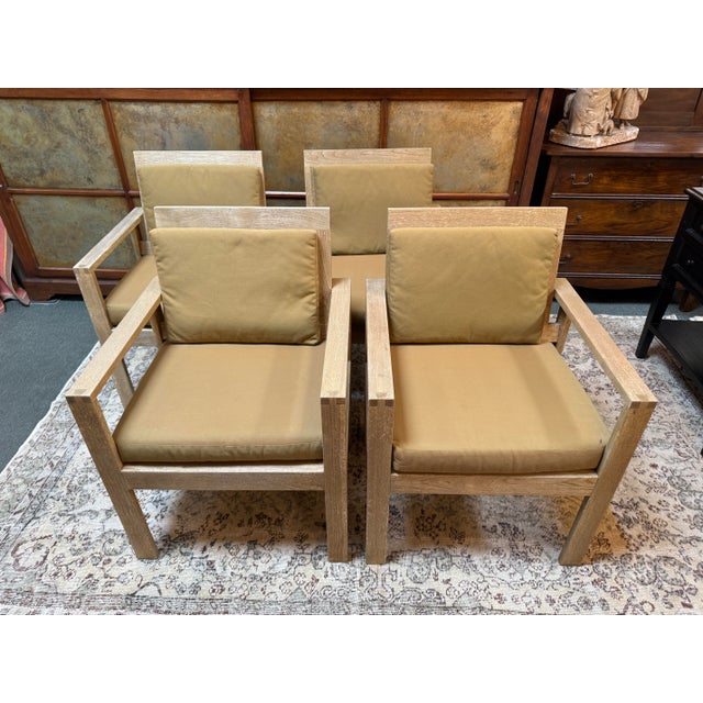 Design Plus Gallery presents a Set of Four Arm Chairs from Williams-Sonoma Home. These matches conversation chairs have a...