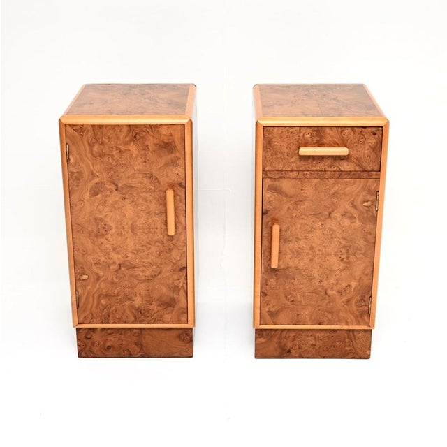 A stunning and beautifully made pair of Art Deco burr walnut bedside cabinets. They were made in England, they date from...
