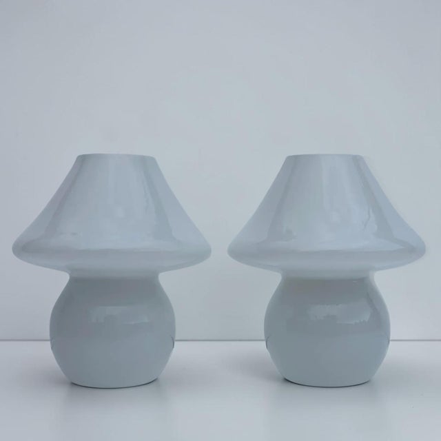 Beautiful pair of white Italian Murano mushroom lamps. Perfect for any living space to add a touch of mid-century modern...