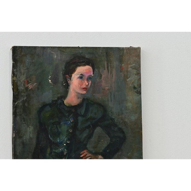 French circa 1890 portrait of a beautiful young woman in a fitted green blouse that complements her complexion, with...