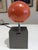 Vintage telescopic desk lamp by Lightolier featuring a spherical enameled steel shade in persimmon, chrome-plated...