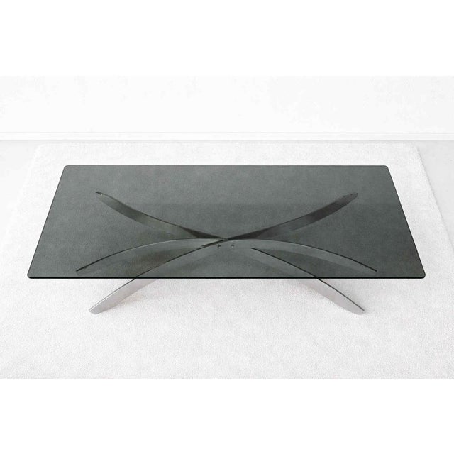 Space Age style coffee table, circa 1970/1980 Brushed steel base and rectangular smoked glass top. In very good condition,...