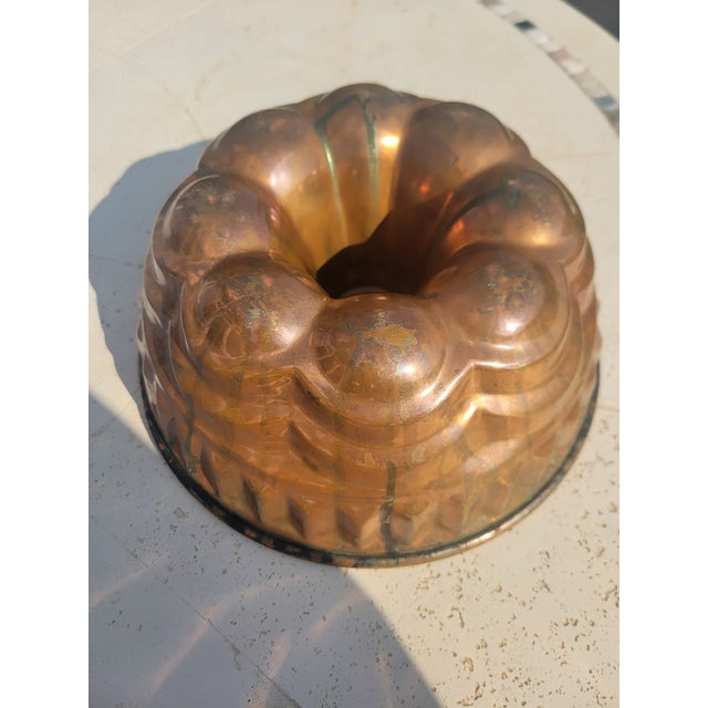 Beautiful mid‑century copper bundt mold crafted by Wagner in West Germany, circa 1950s–1970s. Features deeply fluted...